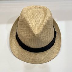 Straw Hat With Black Ribbon Unisex Never Worn New Condition Casual Beige Fedora For Travel, Casual Beige Fedora Straw Hat, Casual Lightweight Beige Fedora, Casual Panama Hat Fedora Style, Beige Adjustable Casual Fedora, Casual Beige Fedora Sun Hat, Beige Casual Panama Hat, Adjustable Beige Casual Fedora, Casual Adjustable Beige Fedora