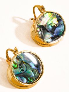 Add some ocean vibes to your outfit with the Kuori 18K Gold Round Natural Abalone Shell Earring. Made with real abalone shell and 18K gold, these earrings are both unique and luxurious. Perfect for a beach day or a night out, they are sure to catch attention and make you stand out in the crowd. 18K Gold Round Natural Shell Earring 18K Gold Plating Natural Abalone Shell Measurement (L x W inch): 0.6 Diameter Gold Abalone Shell Earrings For Gifts, Gold Abalone Shell Round Jewelry, Elegant Gold Abalone Shell Jewelry, Elegant Gold Jewelry With Abalone Shell, Elegant Abalone Shell Pierced Earrings, Elegant Abalone Shell Earrings For Pierced Ears, Midnight Garden, Ocean Vibes, High Vibes