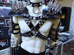 ADJUST SIZE,6 SNAP-PL EASEMENT BACK-CLOSURE. KILLER SCREW-BACK 2 3/4" GIANT  CHROME SPIKES... THE ARMOR IS MADE OF 1 1/8" GENUINE LEATHER. ADJUSTABLE TO YOUR TO YOUR BODY. THE ARMOR IN THIS PICTURE IS A ADJUSTABLE. THE QUALITY OF THIS ARMOR WILL LAST A LIFETIME.   MDLH0090 ....NO INCLUDED CHOKER & ARMBANDS  HIGH QUALITY HANDCRAFTED SPIKED ARMOR.MADE OF HIGH-QUALITY BLACK LEATHER ANOTHER METAL DEVASTATION STAGE GEAR CREATION  SHIPPING:  free 4 days shipping in the U.S.A PRIORITY LARGE FLAT RATE Spiked Armor, Leather Gauntlet, Drag King, Edgy Outfits, Character Outfits, Arm Band, Black Metal, Cool Outfits, Fashion Inspo