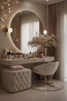 a white chair sitting in front of a mirror next to a vanity with lights on it