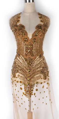 PRICES MAY VARY. 1) Size:This Labellezalady rhinestones bodice can be full bodice, the High is 33.4 inches(90cm),Wide is 15.7 inches(40cm)Great for prom dress. 2)Material:This Gold applique patch Made by good quality grade glass beads and glass rhinestone decal patch,the claw bottom of the diamond is in gold catch made of copper,color can last longer, Soft polyester tulle in skin,can be matched with other designs in same color from Labellezalady. 3)Use:This bodice applique is Perfect for adding Premiere Dresses, Sun Fairy, Otherworldly Beauty, Sweet 16 Outfits, Rhinestone Decal, Nigerian Dress, Dress Applique, Bodice Applique, Bridal Lehenga Designs