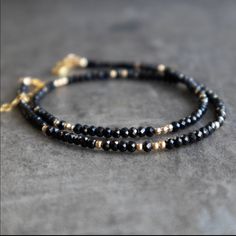 Our Beaded Black Spinel Choker Necklace Is Dainty, Elegant, Perfect For Layering! Comes In A Beautiful Gift Box With Velvet Jewelry Pouch . D E T A I L S Natural Black Spinel Beads Are Sparkly Micro Faceted Handmade In The Usa Bead Size: 2.9mm Randomly Scattered 2mm 925 Sterling Silver Or 14k Gold Filled Beads Available In 3 Sizes. 14" + 1" Choker 16" + 1" Collar 18" + 1" Necklace This Listing For The Choker Crystal Information, Black Tourmaline Necklace, Spinel Gemstone, Crystal Necklaces, Gemstone Beaded Necklace, Dainty Gold Necklace, Protection Necklace, Tourmaline Necklace, Gold Choker Necklace