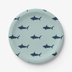 a paper plate with sharks on it