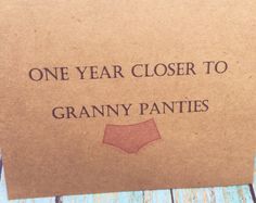 a close up of a piece of paper with words on it that says, one year closer to granny panties