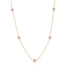 This timeless necklace is set with 1.25-carats of pink sapphires on a 16" inch 18-karat gold chain. Luxury 14k Gold Pink Necklace, Pink Sapphire Round Necklace Fine Jewelry, Fine Jewelry Pink Sapphire Round Necklaces, Elegant Yellow Gold Necklaces With Pink Sapphire, Fine Jewelry Pink Sapphire Necklace, Pink Sapphire Round Necklace, Luxury Pink Sapphire Yellow Gold Necklace, Yellow Gold Pink Sapphire Necklace, Fine Jewelry Pink Sapphire Pendant Necklace