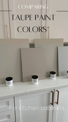 some white cabinets with black paint on them and the words comparing taupe paint colors