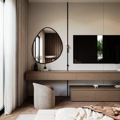 a bedroom with a large mirror on the wall