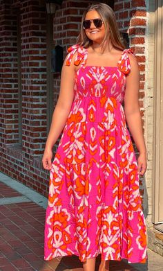 Fall in love with this Pink + Orange Maxi Dress - perfect for summer days! The flattering design and vibrant colors make this dress look amazing, while its comfortable fabric and great quality ensure it will last. Make heads turn this summer, and feel super cute and confident everywhere you go! Ring Ceremony Dress, Exec Photoshoot, Pink And Orange Dress, Curvy Maxi Dress, Orange Sundress, Mom Dresses, Ring Ceremony, Pink Long Dress, Orange Maxi Dress