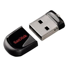 a flash drive with the word sandisk written on it next to an usb device