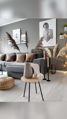 a living room filled with furniture next to a window covered in lights and decor items