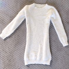 Cozy Sweater Dress In The Softest, Fuzziest Stretchy Fabric. Perfect For Colder Days. Body-Conforming Style Yet Highly Comfortable And Lightweight. Size Xs/S (Fits Both - High Stretch). Perfect Condition, Never Worn! Cozy Long Sleeve Soft Knit Dress, Cozy Soft Knit Long Sleeve Dress, White Crew Neck Sweater Dress For Winter, Cozy Fitted Mini Dress For Winter, Cozy Stretch Dresses For Winter, Cozy Stretch Winter Dresses, White Long Sleeve Sweater Dress For Party, Cozy Crew Neck Winter Dresses, Winter Mini Sweater Dress For Loungewear