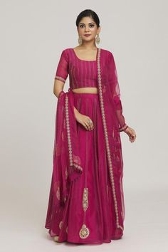 Rani pink can can attached lehenga with bead embroidered filigree motifs embellished by pearls. Comes with embroidered padded blouse and dupatta.
Components: 3
Pattern: Embroidered
Type Of Work: Zardozi, Bead, Pearl
Neckline: Round
Sleeve Type: Half
Fabric: Pure Organza,Pure Self Golden Striped Silk Chanderi
Color: Pink
Other Details: 
Closure:
Blouse: Back hook
Lehenga: Side drawstring
Lehenga Length: 42 Inches
Occasion: Sangeet,Wedding - Aza Fashions Rani Pink, Padded Blouse, Filigree Pattern, Stripe Silk, Set For Women, Aza Fashion, Sleeve Type, Lehenga, Types Of Sleeves