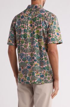 An artistic tropical trees print brings resort-ready appeal to a short-sleeve button-up shirt constructed from soft, breathable cotton. 29" length Front button closure Point collar Short sleeves Chest patch pocket 100% cotton Machine wash, tumble dry Made in the USA of imported fabric Vacation Short Sleeve Shirt With All Over Print, Cotton Camp Shirt With All Over Print For Vacation, Green Short Sleeve Shirt With Palm Tree Print, Green Printed Short Sleeve Shirt With Camp Collar, Pink Tropical Top With Camp Collar, Cotton Hawaiian Shirt With All Over Print, Cotton Camp Shirt With All Over Print, Spring Short Sleeve Hawaiian Shirt With Palm Tree Print, Tropical Relaxed Fit Camp Shirt With All Over Print