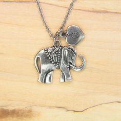 ♥ Silver Elephant charm Necklace Elephant charm Elephant Pendant Personalized Necklace Initial Charm Initial Necklace Customized Jewelry ♥ This is a beautiful elephant charm with hand stamped initial charm on a stainless steel chain, You able to choose initial from a drop down menu, ♥ You will receive 1 necklace ♥ Elephant charm 20x18 mm ♥ Initial charm 10 mm choose from a drop down menu ♥ Stainless steel chain 18 inches ♥ additional initial https://www.etsy.com/listing/766732811 ♥ We strive for Nickel Free Pendant Charm Necklace For Best Friend, Nickel-free Pendant Charm Necklaces For Best Friend Gift, Nickel-free Pendant Charm Necklace For Best Friend, Nickel-free Metal Charm Necklaces As Gift, Elephant Charm Necklace, Beautiful Elephant, Personalised Bangle, Silver Elephant, Silver Elephants