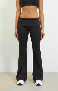 The PAC WHISPER Active Fold-Over Waistband Flare Yoga Pants from the PAC 1980 activewear collection make for the perfect piece for your next workout routine. These low-rise leggings have a fold-over waistband with flared leg openings and a tight figure-flattering fit. This piece is made with our PAC WHISPER™ fabric and has a buttery soft feel and quick-drying design that is perfect for working out or lounging around.   	Solid color leggings 	7" rise 	31.5" inseam 	22" leg opening 	Buttery soft 	Quick-drying 	4-way stretch 	24/7 comfort 	Low-rise 	Fold-over waistband 	Flared leg openings 	Tight fit 	HD silicone P logo 	Fits true to size 	82% polyester, 18% spandex 	Model is wearing a size XS 	PAC WHISPER™: Buttery soft and quick-drying. Perfect from the studio to Fold Over Yoga Pants, P Logo, Color Leggings, Low Rise Leggings, Flare Yoga Pants, Outfit Collage, Yoga Pants Outfit