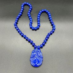 Vibrant Blue Glass Pendant and Bead Necklace Hand Strung | eBay Elegant Blue Lapis Lazuli Beaded Necklaces, Blue Beaded Chain Spiritual Necklace, Blue Beaded Chain Necklace With Spiritual Style, Blue Spiritual Beaded Chain Necklace, Elegant Adjustable Blue Crystal Necklace, Elegant Blue Crystal Necklaces With Round Beads, Elegant Blue Crystal Necklace With Round Beads, Blue Glass Beaded Chain Jewelry, Blue Lapis Lazuli Jewelry With Large Beads