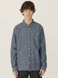 The Curtis shirt from YMC is part of their Earth collection. A timeless staple, sustainably constructed in a pure organic cotton chambray. A relaxed fit, finished with corozo buttons. Made in Portugal by YMC’s ethically certified production partner. - 100% Organic cotton - Relaxed fit long sleeve shirt - Garment washed organic chambray - Twin needle topstitch seams - Self-fabric chest pocket with loop - Corozo button fastening and cuffs - Made in Portugal Classic Wardrobe, Mens Button Up, Men Shirt Style, Men's Shirts, British Style, Chest Pocket, Chambray, Long Sleeve Shirt, Cotton Shirt