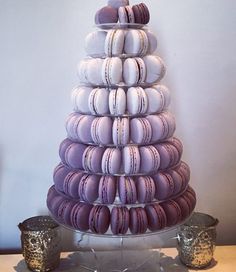 a large stack of macaroons sitting on top of each other