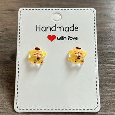 This Listing Is For A Cute Pair Of Handmade Pompompurin Earrings. Earring Stud Is 5mm And Made Out Of Stainless Steel. Hypoallergenic Earring Post And Earring Back. Charms Are Made Out Of Resin/Acrylic. Super Cute For Kids Or Adults! :) **Comes From A Smoke Free Home** Playful Hypoallergenic Yellow Earrings, Playful Yellow Hypoallergenic Earrings, Cute Handmade Yellow Earrings, Pompompurin Accessories, Resin Acrylic, Kids Accessories Jewelry, Earring Stud, Earring Post, Girl Jewelry