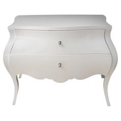 a white dresser with two drawers on one side and an open drawer on the other