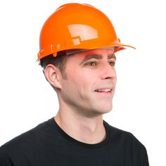 a man wearing an orange hard hat