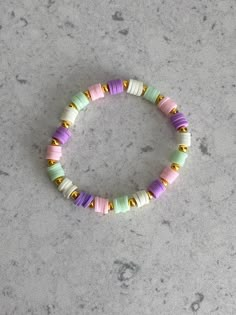 Ready for Easter? This bracelet is perfect for YOU 🐣 BUY NOW WHILST ITS STILL HERE!! 💗🙈 Pastel Bracelets Beads, Spring Bracelets Clay Beads, Easter Clay Bead Bracelet Ideas, Spring Bracelet Ideas, Clay Bead Bracelet Ideas Spring, Spring Beaded Bracelets, Easter Heishi Bracelet, Easter Bracelet Ideas, Pastel Beaded Bracelets For Gift