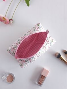 "This cute and floral makeup bag will help you in many ways. You can put your makeup in this toiletry bag when you are at a party or out. You can make a loved one happy by gifting it to a friend. If you are going to travel, you can put your cosmetic bag in your suitcase and prevent your make-up materials from being messy.You can use it as a pencil case when going to school.🌸 🧺Materials: Cotton fabric is used in the outer and inner fabric. There is a fiber fabric between the two, so we have a f Pink Cosmetic Storage With Removable Pouch, Pink Zipper Pouch For Cosmetics And Toiletries Gift, Pink Cosmetic Storage Zipper Pouch As Gift, Pink Cosmetic And Toiletry Storage Zipper Pouch As Gift, Pink Gift Cosmetic And Toiletry Storage With Zipper, Everyday Pink Zipper Pouch For Cosmetics And Toiletries, Everyday Pink Cosmetic Zipper Pouch, Handmade Makeup Bag, Floral Makeup Bag