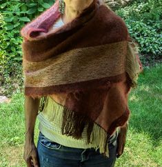 Fabulous natural materials in this shawls. A very warm, snuggly wrap Handwoven One-size Shawl For Fall, Handwoven Shawl For Fall, One Size, Alpaca Wrap Scarf One Size, Cozy Alpaca Shawl Scarf, Bohemian Alpaca Wrap One Size, Bohemian Alpaca Wraps One Size, Bohemian Alpaca Shawl For Fall, Brown Alpaca Shawl For Fall, Bohemian Alpaca Wrap For Fall