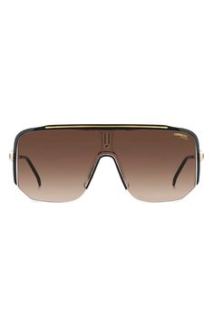 Big, bold design elevates head-turning sunglasses fitted with an oversized shield lens. 99mm lens width; 1mm bridge width; 140mm temple length 100% UV protection Injection-molded polyamide Imported Shield Sunglasses, Mens Eyewear, Brown Gradient, Bold Design, Eyewear Sunglasses, Brown Gold, Uv Protection, Turning, Temple