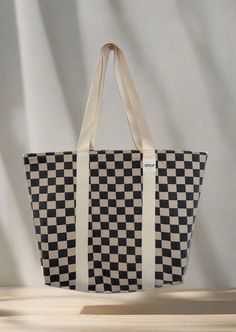 Designed + Manufactured in Los Angeles at our facility 100 Cotton Twill printed checkered 100 Cotton Webbing Straps Zipper inside pocket and additional throw and go pocket Bartacking on straps for heavy duty durability Fully lined 23" x 14" x 5" Plaid Tote Bag For Travel, Everyday Plaid Tote Bag, Rectangular Cotton Gingham Bags, Checkered Tote Bag, Large Capacity Plaid Tote Shoulder Bag, Gift Card Sale, Inside Pocket, Cotton Twill, Heavy Duty