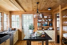 the kitchen is clean and ready to be used for cooking, baking, or eating