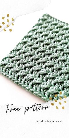 a green and white crochet dishcloth with gold confetti sprinkles