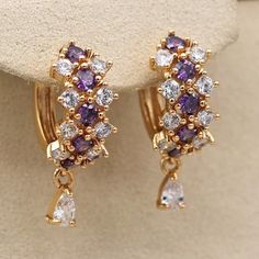 1.Material: 18k Gold Filled 2.Size Earrings:2.5*0.9 Cm / 0.98*0.35 Inches Hoop Dia: 1.2cm / 0.47 Inches 3. This Is For One Pair Earrings Elegant Purple Amethyst Hoop Earrings, Purple Cubic Zirconia Earrings For Pierced Ears, Gold Amethyst Earrings For Parties, Purple Cubic Zirconia Party Earrings, Purple Cubic Zirconia Earrings For Party, Elegant Gold Amethyst Hoop Earrings, Purple Cubic Zirconia Earrings With Sparkling Stones, Purple Drop Earrings With Sparkling Stones, Purple Cubic Zirconia Earrings