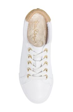 Lilly's casual glamour extends to your footwear in these tennis-white lace-ups accented by rhinestone eyelets and a glint of gold at the heel. Style Name:Lilly Pulitzer Lux Hallie Sneaker (Women). Style Number: 6043772. White And Gold Sneakers, Casual Glamour, Tennis Whites, White Lilly, White Tennis Shoes, White Summer, White Sneakers, Women Style, Up Styles