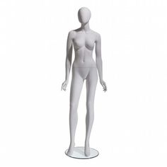 a white female mannequin standing on a stand