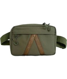 Like all Adventurist Backpacks, the Summit Sling Bag is made with an ultra-durable, water-resistant 1000D polyester and synthetic leather details. It is designed with dual front + back padding to ensure protection for all of your belongings. The shoulder strap can be adjusted to be worn cross-body, or around the waist as a fanny pack.Perfect for hiking, camping, travel, biking, climbing, festivals, barbeques, running errands, or anywhere your day (or night) might take you - this sling bag is rea Modern Nylon Chest Bag For Outdoor Activities, Durable Functional Chest Bag For Everyday Use, Modern Nylon Chest Bag For Outdoor, Outdoor Rectangular Chest Bag With Functional Pockets, Durable Functional Chest Bag, Rectangular Outdoor Chest Bag With Functional Pockets, Rectangular Chest Bag With Functional Pockets For Outdoor, Practical Rectangular Chest Bag With Pockets, Nylon Chest Bag With Functional Pockets For Daily Use