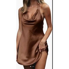 Cantonwalker Women's Cowl Neck Halterneck Slip On Backless Satin Mini Dress Sexy Silky Party Club Bodycon Dress. Color: Coffee Size:Small Bust: 35.2” Waist:33.1” Length:24.8” Product Details Fabric Type:Satin Fabric Care Instructions:Hand Wash Only Closure Type: Zipper Neck Style: Cowl Neck About This Item Satin Dress, Adjustable Halter Neck, Cowl Neck, Not Lined, Zipper.Lightweight And Small-Stretchy Satin Fabric. Mini Dress, Slip-On Style, Flirty Halter Neck Slip Dress For Night Out, Backless Satin Sleeveless Dress For Date Night, Casual Halter Neck Slip Dress For Party, Satin Sleeveless Halter Dress For Date Night, Sleeveless Satin Halter Dress For Date Night, Chic Brown Sleeveless Party Dress, Brown Summer Party Slip Dress, Solid Sleeveless Satin Mini Dress, Casual Sleeveless Satin Slip Dress