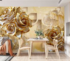 a dining room with a table and chairs in front of a wall mural that has gold roses on it