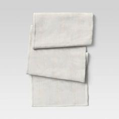 two white sheets folded on top of each other