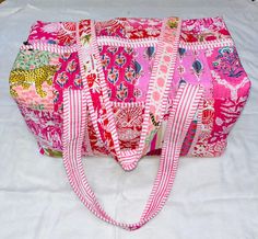 Cotton Quilted  block print weekend bags YOU WILL GET ASSORTED PATCHES ( In This Video Bag Size 24 x 12 x 12)  100% cotton fabric SIZE:  medium : 16" x 8" x 8 " large : 18" x 9" x 9 Big Size :20" x 10" x 10"  the bags feature two pockets each on the outside   :Color : Assorted & We Have More Color  : Quilted Padding   great for weekend getaways, beach trips and as carry on bags while travelling Ask me for custom orders, personalized pouches or wholesale  CARE: Machine wash separately in cold water Large Capacity Pink Rectangular Duffle Bag, Pink Rectangular Travel Bag As Gift, Pink Rectangular Everyday Duffle Bag, Pink Rectangular Duffle Bag, Pink Rectangular Travel Bag For Gift, Pink Rectangular Travel Bag For Daily Use, Large Capacity Rectangular Pink Weekender Bag, Pink Rectangular Weekender Bag, Pink Rectangular Patchwork Bag