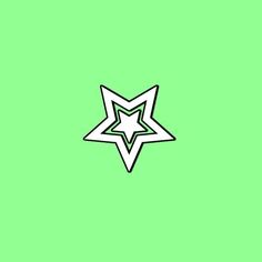 a black and white star on a green background