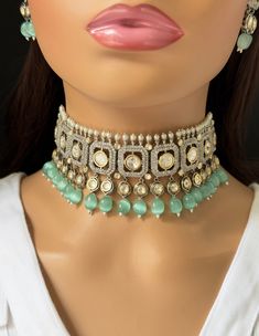 Mint Premium Dual Tone uncut Polki Kundan Choker,Sabyasachi choker, Bollywood Indian Pakistani jewelry for wedding , Bridal jewelry Gold-plated foiled Kundan necklace set. Regular Size And Adjustable Ships from California, USA Delivery in 2-5 business days in the USA. Other colors can be found here https://www.etsy.com/listing/1423048212/red-premium-dual-tone-uncut-polki-kundan?ref=listings_manager_grid https://www.etsy.com/listing/1423049936/pink-premium-dual-tone-uncut-polki?ref=listings_manager_grid Color, shades, and texture displayed may slightly vary from the actual product due to digital image limitations. We request you consider these minor variations. Please expect the possibility of some slight imperfections when buying handmade jewelry. Please let me know if you have any questio Festive Bridal Choker Necklace For Reception, Bridal Choker Necklace With Tilla For Reception, Reception Bridal Tilla Choker Necklace, Reception Kundan Choker Necklace, Bollywood Style Choker For Reception Hand Set, Heavy Choker Bridal Necklace For Reception, Heavy Bridal Choker Necklace For Reception, Heavy Bridal Choker For Reception, Silver Tilla Choker For Reception