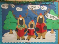 a bulletin board with reindeers reading books and christmas trees in the background that says, joy to the world of reading