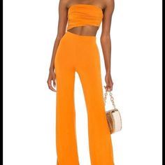 Cutest Orange Jumpsuit Perfect For Summer ! Only Worn Once In Perfect Condition !! Orange Fitted Chic Jumpsuits And Rompers, Chic Orange Fitted Jumpsuits And Rompers, Bandeau Fitted Jumpsuits And Rompers For Spring, Chic Fitted Strapless Jumpsuit For Vacation, Fitted Orange Jumpsuit For Night Out, Fitted Strapless Bandeau Jumpsuit For Day Out, Casual Fitted Bandeau Strapless Jumpsuit, Orange Jumpsuit, Beautiful Jumpsuits