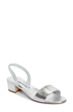 Fashioned from silver metallic leather, this modern sandal is set on a low block heel and secured with a stretchy slingback strap. 1 1/4" heel, 31mm (size 38.5) Elasticized slingback strap Leather upper, lining and sole Made in Italy Designer Shoes Elegant Silver Slingback Sandals With Padded Heel, Silver Slingback Sandals For Evening, Silver Slingback Sandals For Formal Summer Events, Silver Slingback Sandals For Summer Evenings, Silver Slingback Sandals For Spring, Silver Low Heel Slingback Sandals For Summer, Silver Slingback Open Heel Sandals For Spring, Silver Open Heel Slingback Sandals For Spring, Silver Sandals With Medium Width And Open Heel