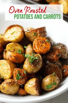 roasted potatoes and carrots in a white bowl with the title overlay reads, oven roasted potatoes and carrots