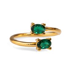 Double Sapphire Stone & Gold Dainty Adjustable Ring, designed for both elegance and versatility. Crafted with 24k gold plating on brass, this adjustable ring showcases two striking emerald stones placed on opposite ends, creating a chic yet minimalist look. Perfect for daily wear, this ring can be worn alone or effortlessly stacked with your other favorite rings. Whether you're dressing up or down, this timeless piece adds a touch of sophistication to any outfit. Details Crafted with high-quality brass and plated with 24k gold for a luxurious finish. Emerald stones Adjustable size Avoid contact with chemicals, makeup, perfume. Do not use dips or abrasive cleaners on ring. To clean and brighten it up your ring, wipe them gently with jewelry polishing cloth. Elegant Gold Emerald Ring With Tarnish Resistance, Adjustable Gold Emerald Ring, Elegant Gold-plated Emerald Ring, Elegant Adjustable Gold Emerald Ring, Elegant Adjustable Open Emerald Ring, Adjustable Gold Emerald Open Ring, Adjustable Gold Emerald Ring For Anniversary, Forever Jewelry, Jewelry Ring Box