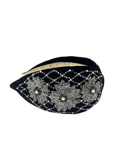 Perfect for any occasion, the Katdana Star headband features silvery beadwork that shines against the backdrop of a rich black base. Black 100% Polyester Adjustable Beaded Headband For Party, Elegant Evening Headband With Rhinestones, Adjustable Embellished Headband, Evening Headband With Rhinestones, Embellished Adjustable Headpieces For Evening, Elegant Adjustable Embellished Headband, Silver Headband For Evening, Beaded Headband For Party, Beaded Headband For Parties