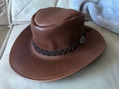 Trendy Fashion Jacaru Australia Swagman Bushman Brown Leather Braided Head Band Hat Adult Small, Winter Accessories Brown Braided Hat For Rodeo, Western Braided Brimmed Hat, Bohemian Braided Brown Hat Band, Vintage Handmade Leather Hat, Vintage Brown Leather Brimmed Hat, Western Brown, Hat Band, Winter Accessories, Women's Accessories