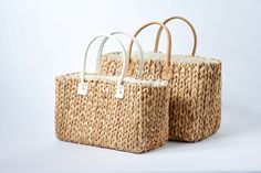 Because you fell in love with our Fullerton straw bag, we designed a second version. Buttery ivory leather, slightly smaller size and the same amazing handwoven hyacinth natural straw. This tote is topped off with a linen draw cord closure to keep your belongings secure. Fill it up with your favorite sun or pool essentials or take it to lunch. Content:Hyacinth StrawImported Size:Width: 15.5"Height: 9"Depth: 7.5"Handle Drop: 7.5" Pool Essentials, Straw Tote Bag, Straw Tote, Beach Bags, St Augustine, Tote Bag Leather, Fell In Love, Decorative Wicker Basket, Leather Handle